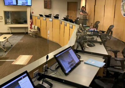Custom dividers in the Matanuska-Susitna Borough Assembly chambers protect council members.