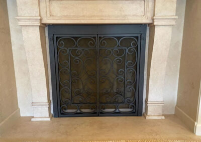 Fabricated metal fireplace doors - closed