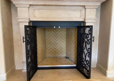 Fabricated metal fireplace doors - open